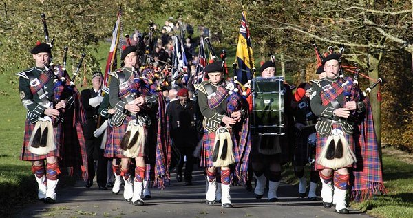 Maybole Pipe Band leads the procession. Click on the image to view a larger picture.