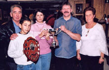 Chris' widow Eleanor, son David and parents in the High Society, with pub boss Matt Davey (still with his moustache).