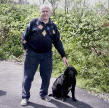 Jim Sym died in December of 2002. Shown here with his dog Sophie.