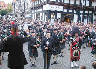 Fourteen pipe bands get together in Schotten town centre to mark the close of the Scottish weekend. The incredible sound of well over a hundred pipers and drummers playing "Highland Cathedral" brought a lump to the throat of several Scots
