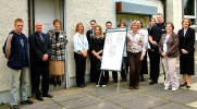 left to right Chris Griffin youth support worker; Rodger Stewart, Carrick Academy head  teacher; Isabel Johnstone, depute head; Sina Currie, school nurse; Sammi Clark, depute head girl, Chelsea Henderson, competition winner; Neil  Wilson, depute head boy; Mary Jeans, school nurse; Carol George, Community  Education; Karen Walker, Integrated Community Schools Development Worker; June Milne, public health nurse for schools; Ian Thornton, community  policeman; Yvonne Kiltie, Community Education; and Margaret Burns, acting  principal officer Community Education.