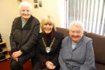 Inside the newly opened centre Provost Winifred Sloan chats with Nessie Connolly and Pearl Barton.