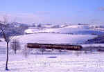 Train near Maybole. Baltersan Castle can be seen in the background.